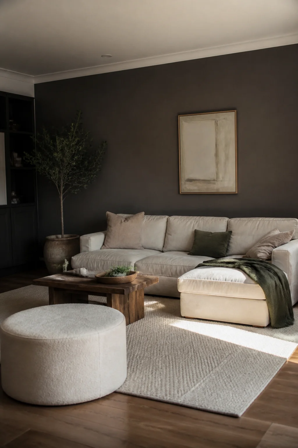 Paint an accent wall in deep charcoal or warm taupe